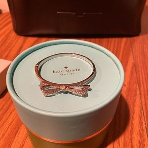 Kate spade silver bracelet with crystals.